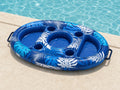 Blue tropical-print Poolora Float serving tray beside a swimming pool