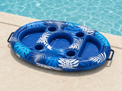 Blue tropical-print Poolora Float serving tray beside a swimming pool